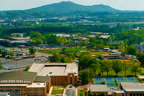 Kennesaw State University campus aerial shot with double peaked mountain in background